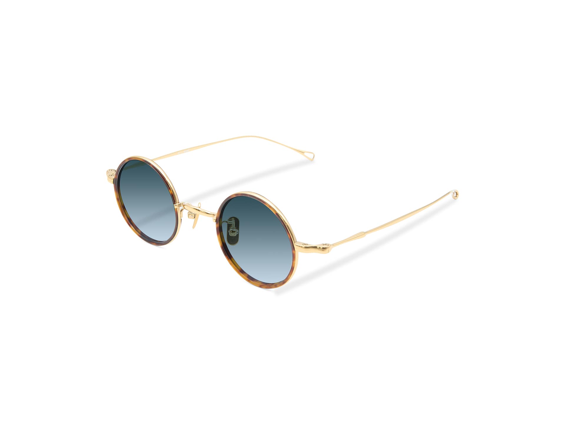 Monture ronde PAWA Eyewear Tokyo en métal doré avec cerclage écaille et verres bleu dégradé vue trois quarts opticien Paris 1er rue de Rivoli